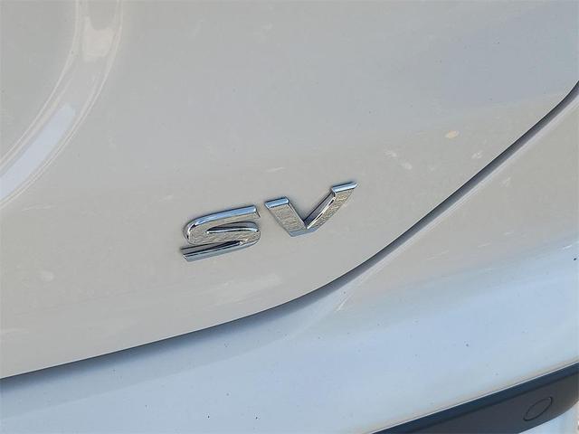 Photo of 2024 Aspen White Tricoat/Super Black Nissan Kicks