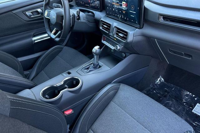 Photo of 2025 Vapor Blue Ford Mustang