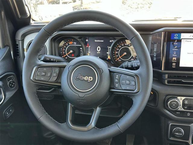 Photo of 2025 Granite Crystal Metallic Clearcoat Jeep Wrangler
