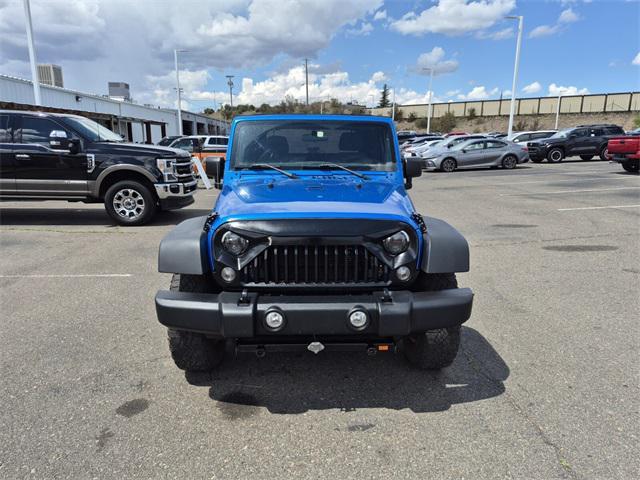 Photo of 2015 Hydro Blue Pearl Coat Jeep Wrangler