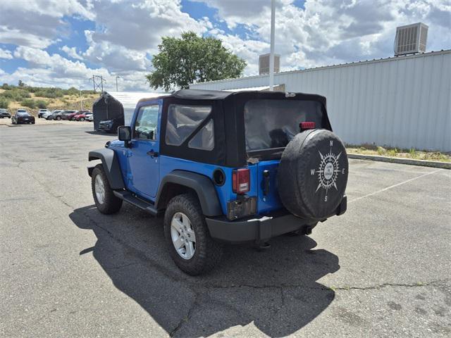 Photo of 2015 Hydro Blue Pearl Coat Jeep Wrangler