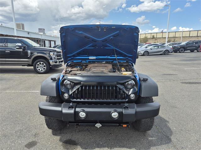 Photo of 2015 Hydro Blue Pearl Coat Jeep Wrangler