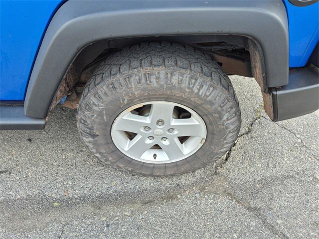Photo of 2015 Hydro Blue Pearl Coat Jeep Wrangler