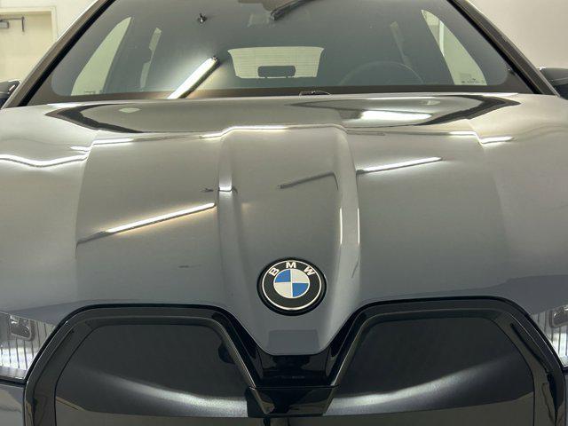 Photo of 2026 Storm Bay Metallic BMW iX
