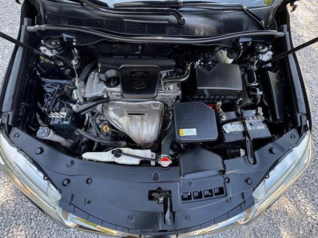 Photo of 2016 Midnight Black Metallic Toyota Camry