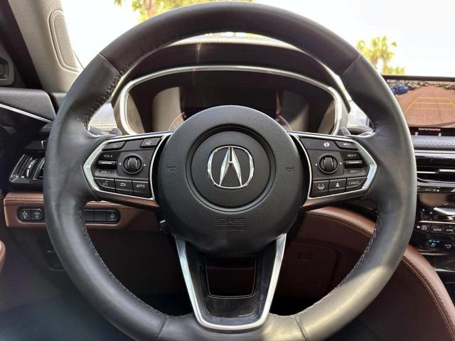 Photo of 2024 Liquid Carbon Metallic Acura MDX