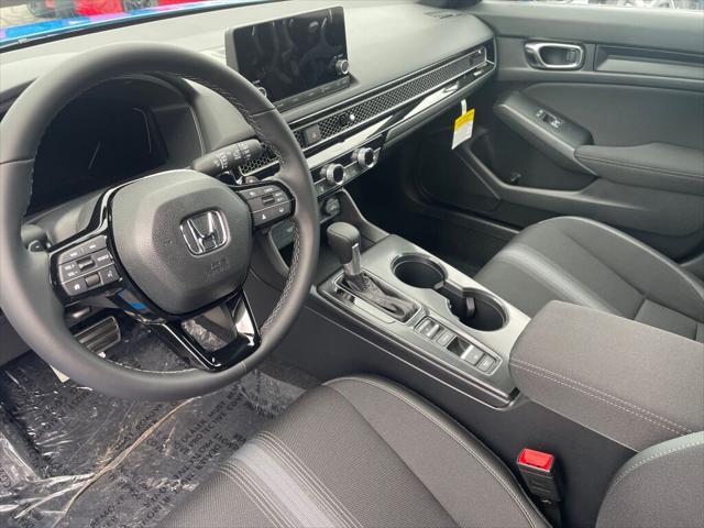 Photo of 2025 Boost Blue Pearl Honda Civic