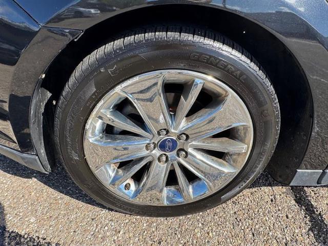 Photo of 2012 Tuxedo Black Metallic Ford Taurus