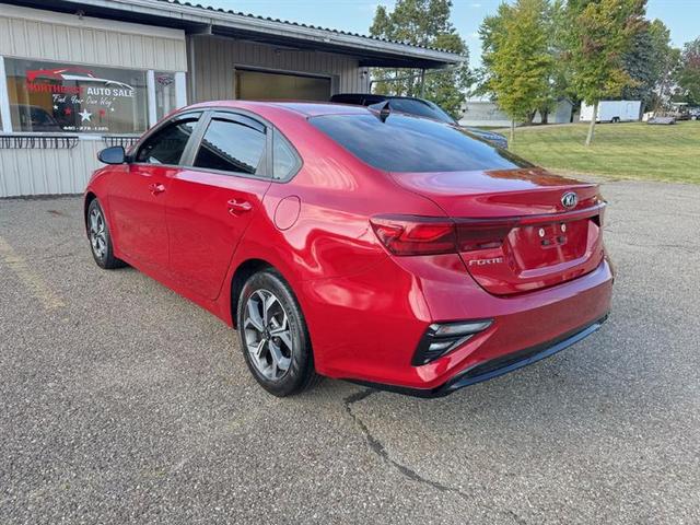 Photo of 2021 Currant Red Kia Forte