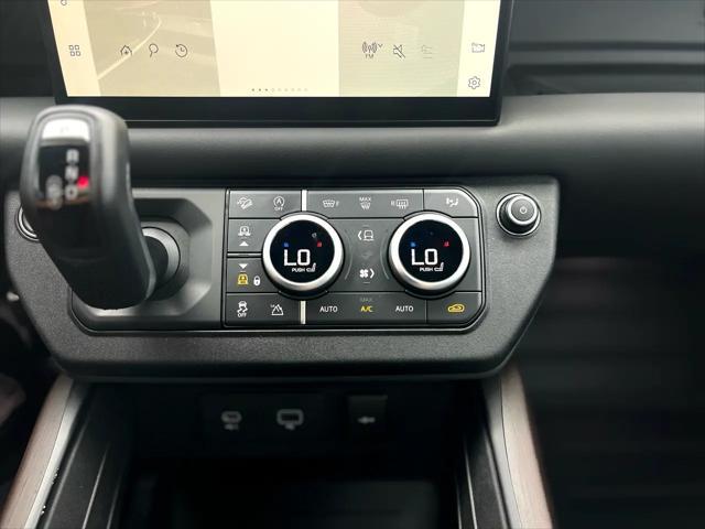 Photo of 2023 Santorini Black Metallic Land Rover Defender