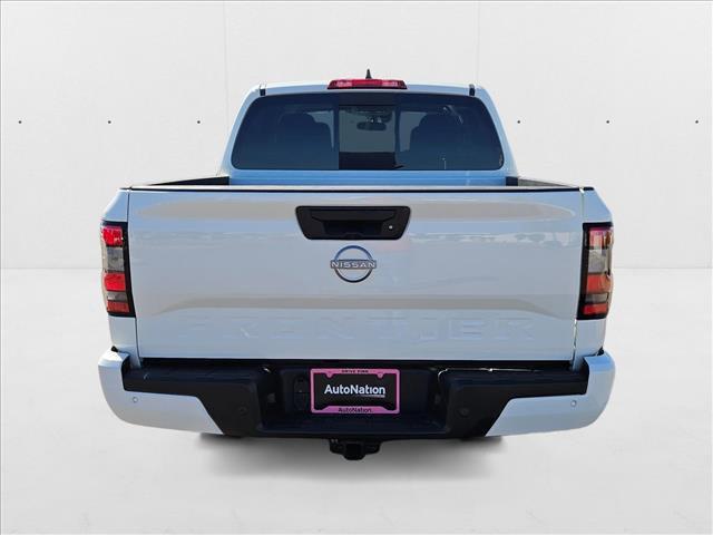 Photo of 2025 Glacier White Nissan Frontier
