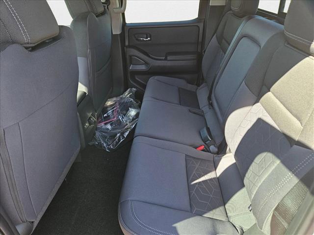 Photo of 2025 Glacier White Nissan Frontier