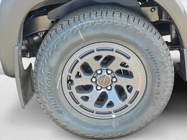 Photo of 2025 Boulder Gray Pearl Nissan Frontier