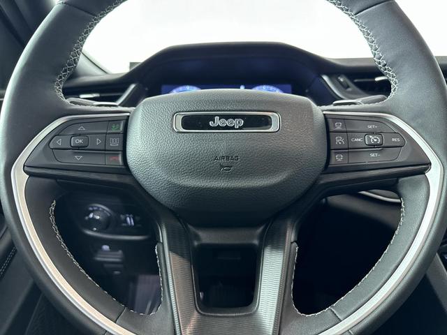 Photo of 2024 White Jeep Grand Cherokee