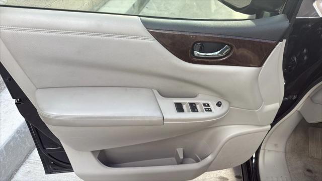Photo of 2014 Black Nissan Quest
