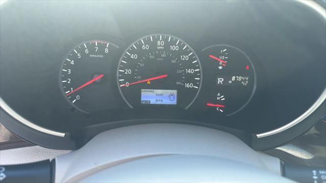 Photo of 2014 Black Nissan Quest