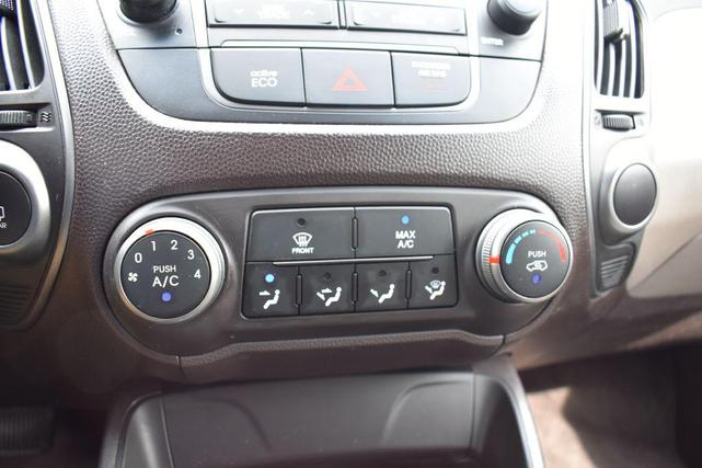 Photo of 2015 Winter White Hyundai TUCSON