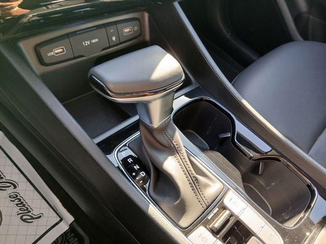 Photo of 2024 White Pearl Hyundai TUCSON