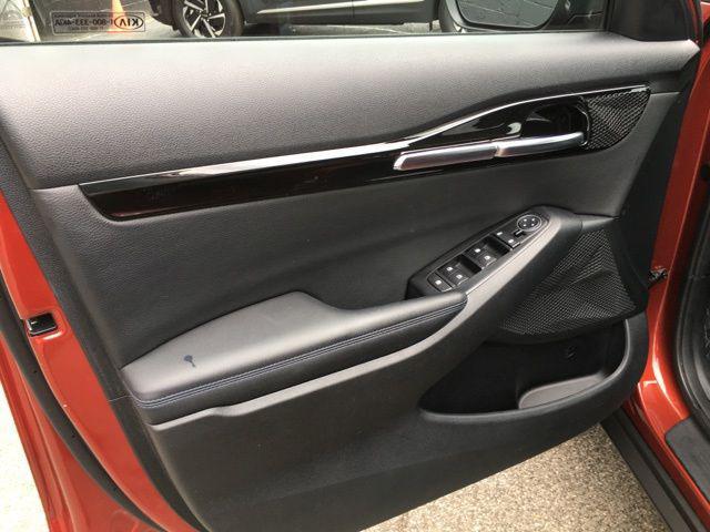 Photo of 2021 Mars Orange Kia Seltos