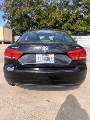 Photo of 2014 Black Volkswagen Passat