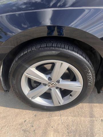 Photo of 2014 Black Volkswagen Passat