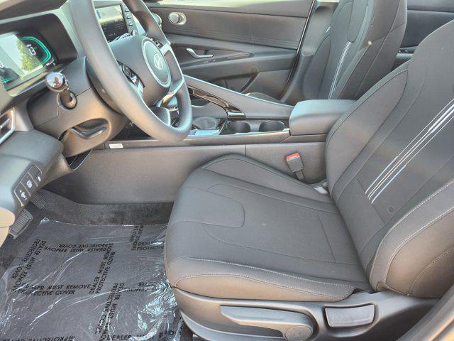 Photo of 2025 Serenity White Hyundai ELANTRA HEV
