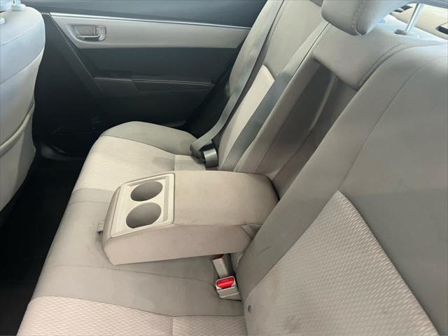 Photo of 2015 Super White Toyota Corolla
