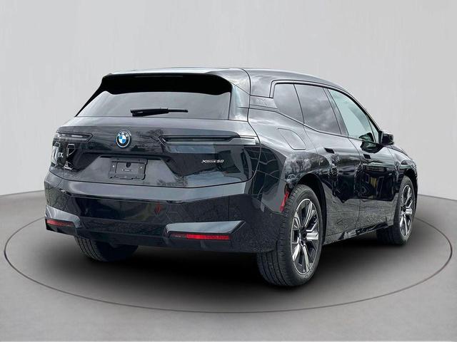 Photo of 2025 Black Sapphire Metallic BMW iX