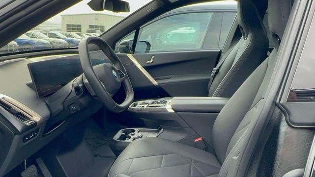 Photo of 2025 Black Sapphire Metallic BMW iX