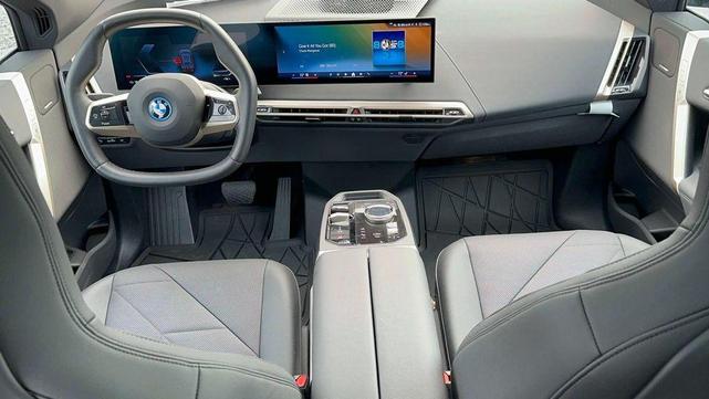 Photo of 2025 Black Sapphire Metallic BMW iX