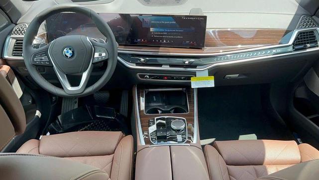 Photo of 2026 Manhattan Green Metallic BMW X5 PHEV