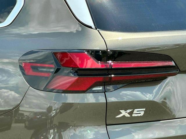 Photo of 2026 Manhattan Green Metallic BMW X5 PHEV