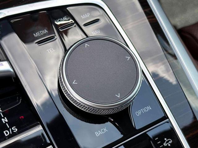 Photo of 2026 Manhattan Green Metallic BMW X5 PHEV