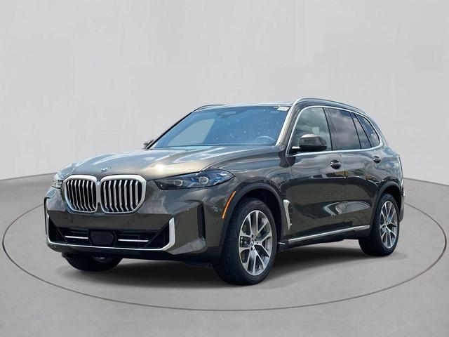Photo of 2026 Manhattan Green Metallic BMW X5 PHEV