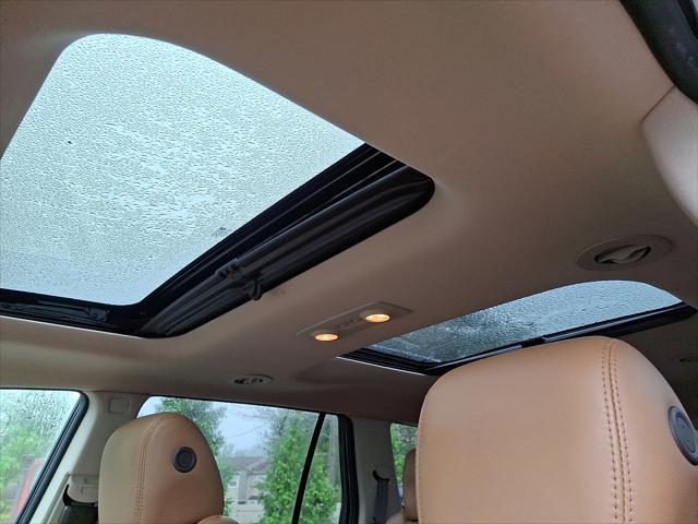 Photo of 2016 Crimson Red Tintcoat Buick Enclave