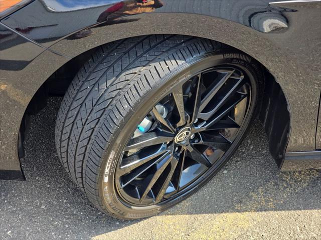 Photo of 2023 Midnight Black Metallic Toyota Camry