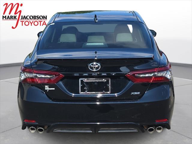 Photo of 2023 Midnight Black Metallic Toyota Camry