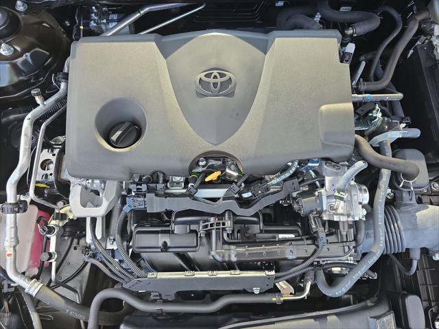 Photo of 2023 Midnight Black Metallic Toyota Camry