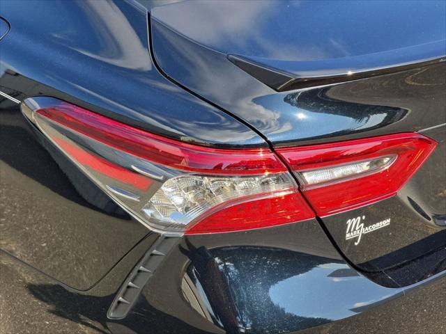 Photo of 2023 Midnight Black Metallic Toyota Camry