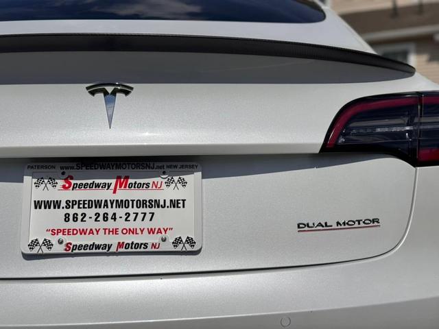 Photo of 2022 Pearl White Multi-Coat Tesla Model 3
