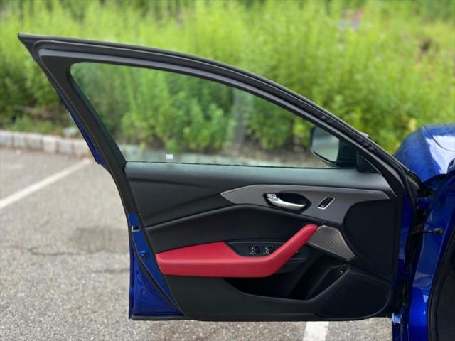 Photo of 2022 Apex Blue Pearl Acura TLX
