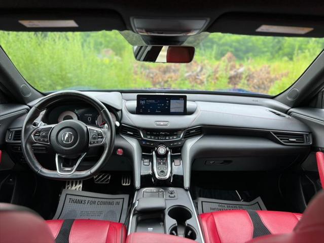 Photo of 2022 Apex Blue Pearl Acura TLX
