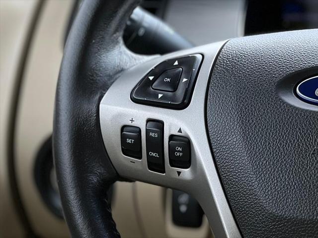 Photo of 2013 Kodiak Brown Metallic Ford Taurus