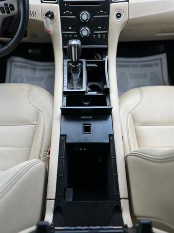 Photo of 2013 Kodiak Brown Metallic Ford Taurus