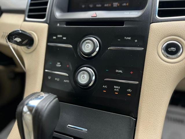 Photo of 2013 Kodiak Brown Metallic Ford Taurus