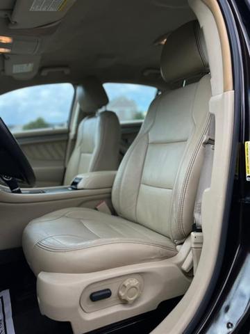 Photo of 2013 Kodiak Brown Metallic Ford Taurus