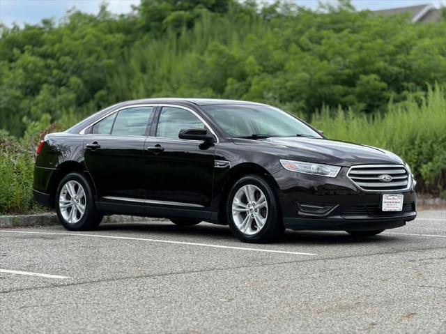 Photo of 2013 Kodiak Brown Metallic Ford Taurus