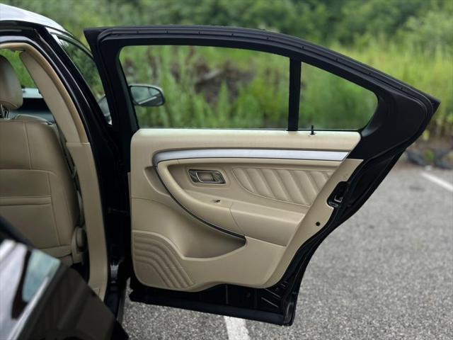 Photo of 2013 Kodiak Brown Metallic Ford Taurus