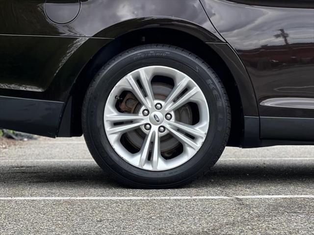 Photo of 2013 Kodiak Brown Metallic Ford Taurus