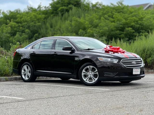Photo of 2013 Kodiak Brown Metallic Ford Taurus